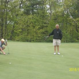 Lining up their putts John Theo, PGA with amateurs at Red Tail GC May 14, 2018